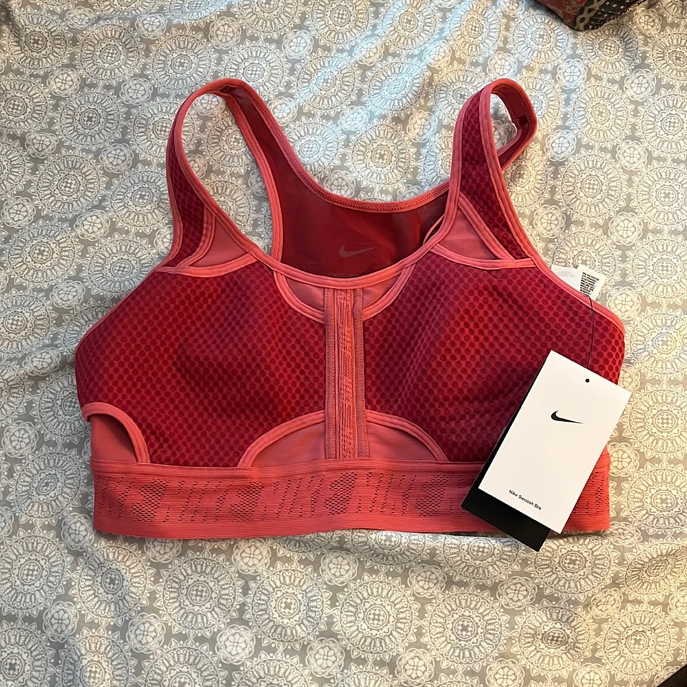 pink nike dry fit sports bra, size medium